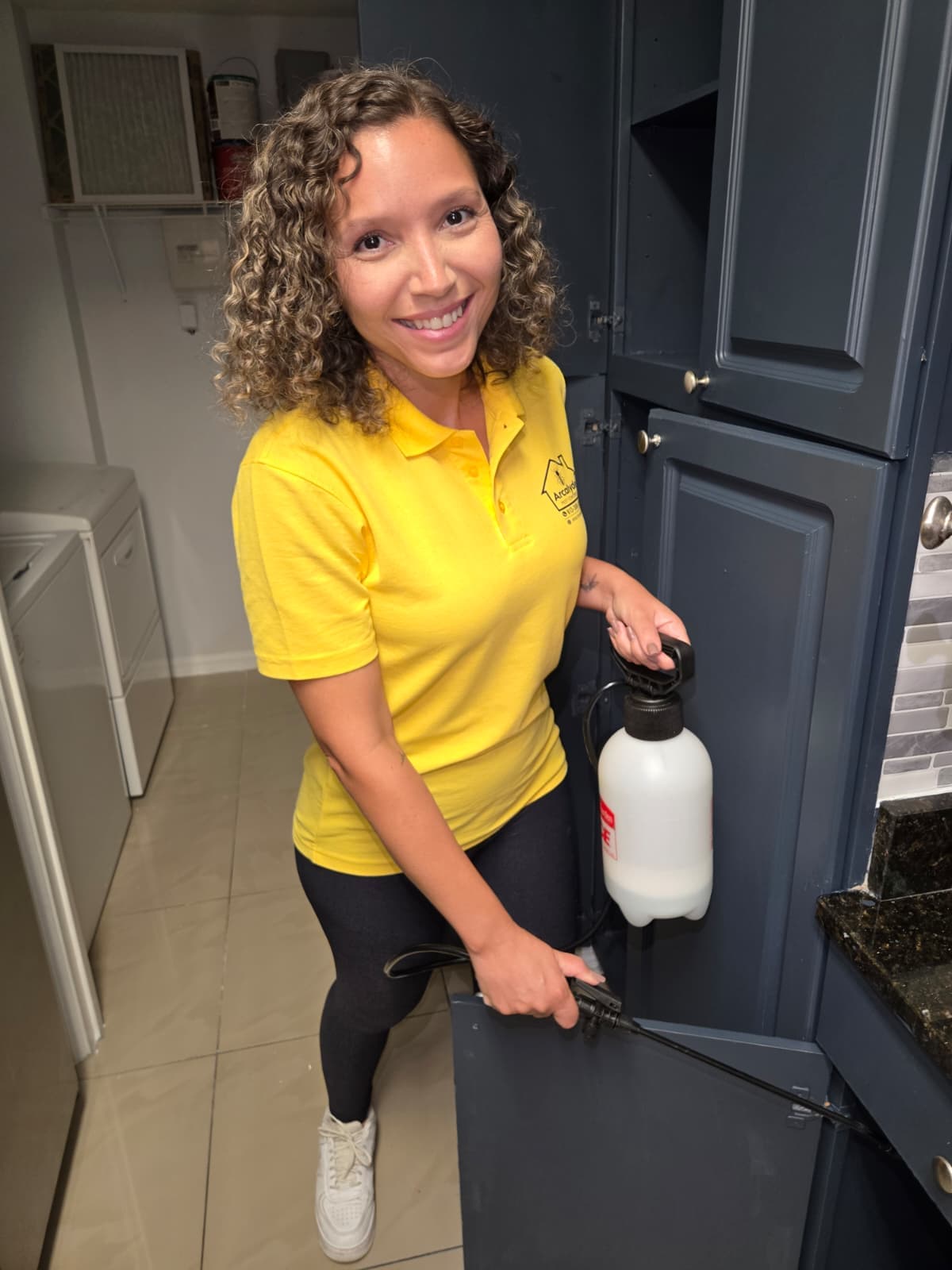 Arcalyde pest control professional with equipment